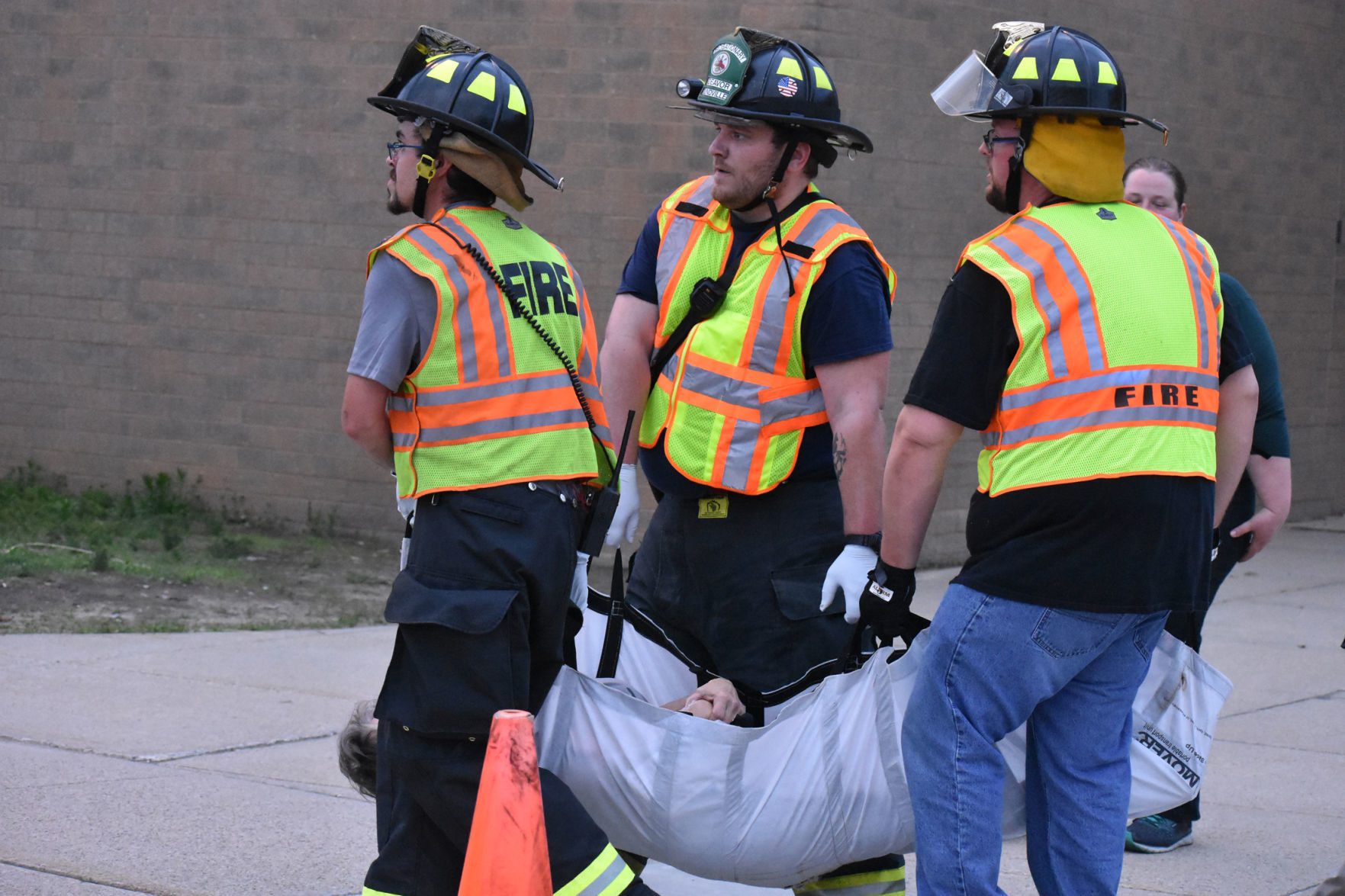 First responders carry victim's body